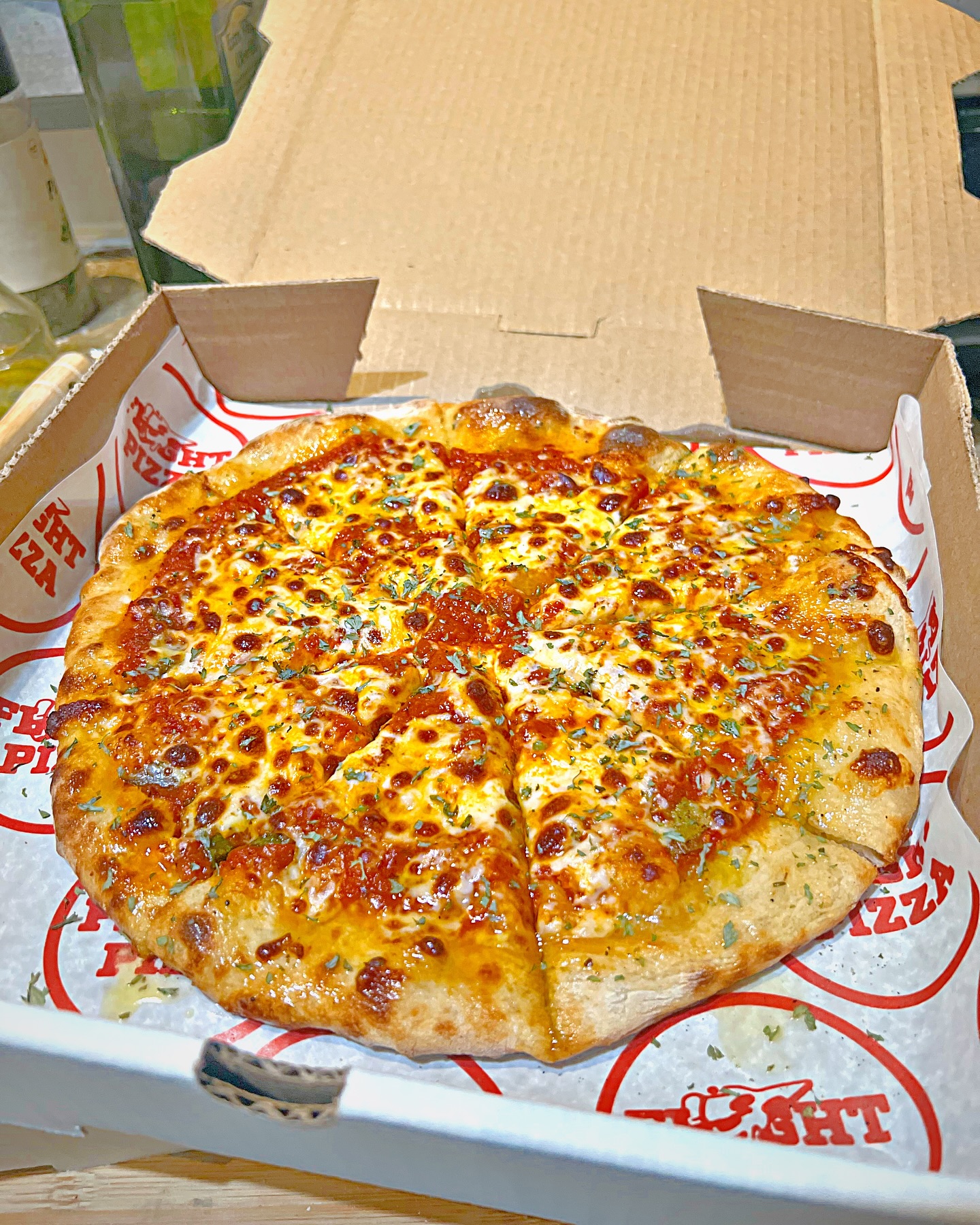 Fresh cheese pie in a Flyght Pizza box
